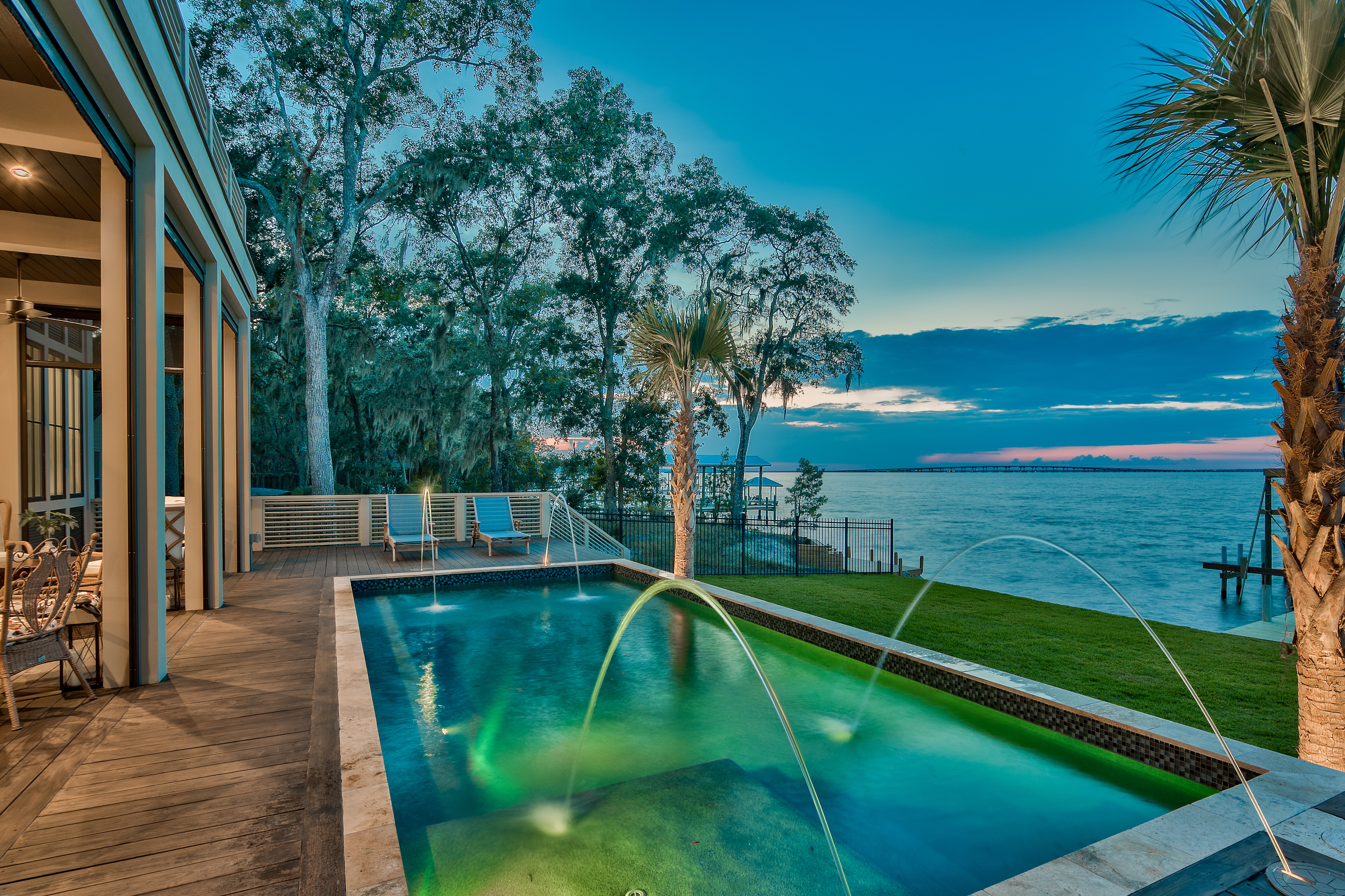 A quiet evening overlooking the bay from the private pool of a bay front home in Santa Rosa Beach