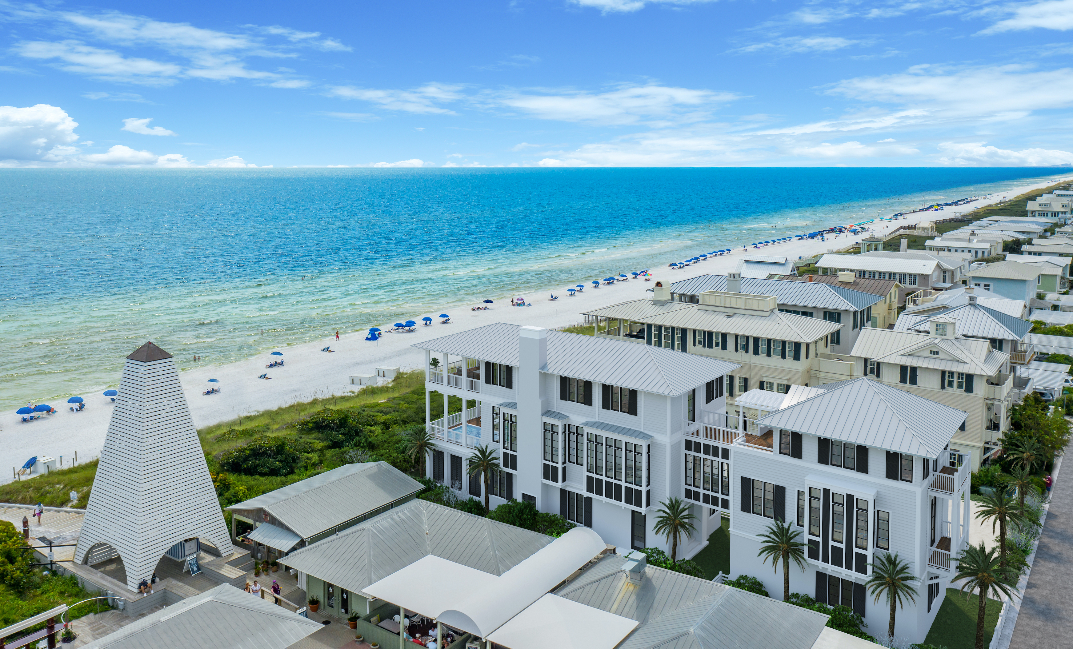 An aerial view of a gulf front home in Seaside with the beautiful gulf waters 