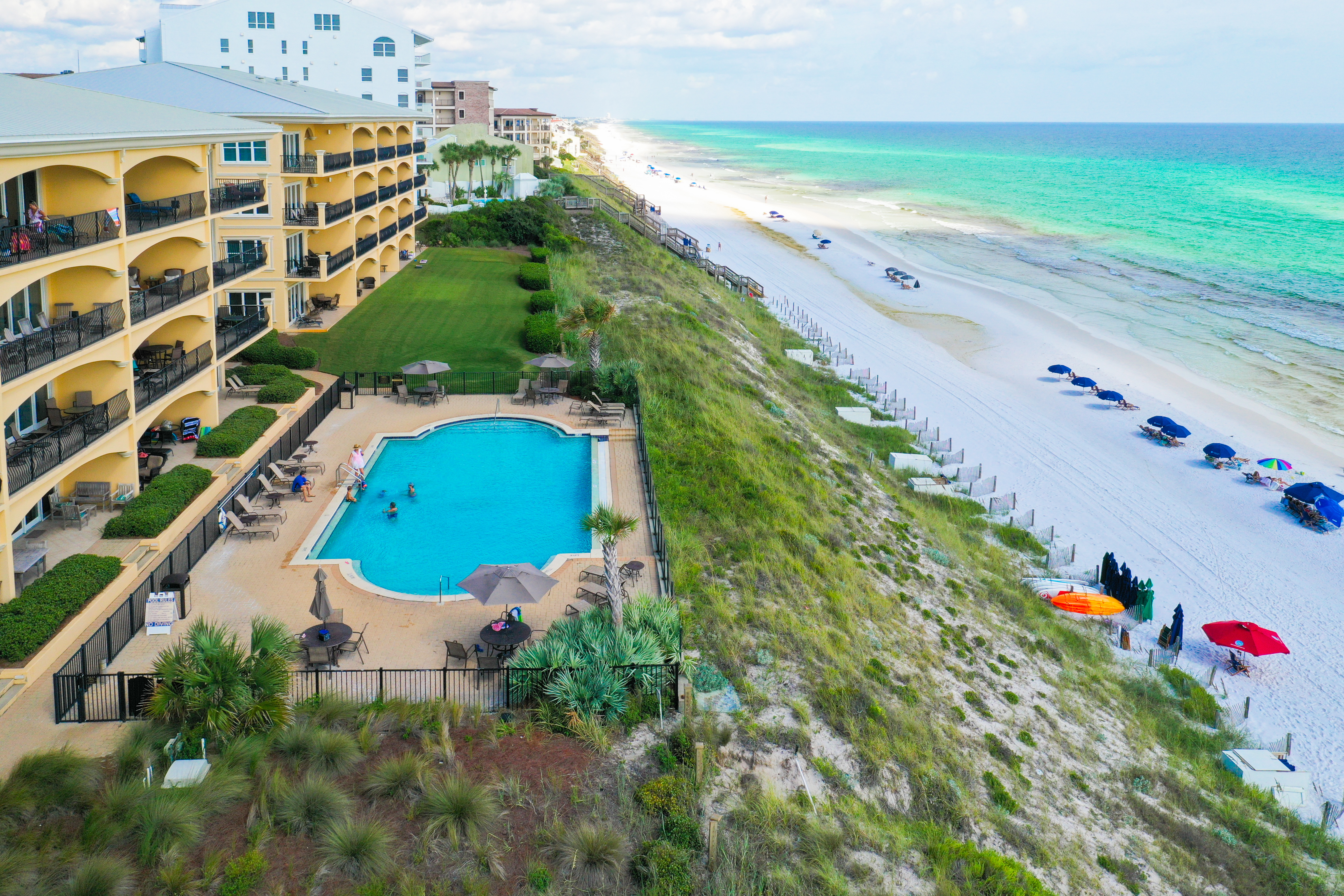 A view of the gulf front pool at a condominium on the beach along 30A