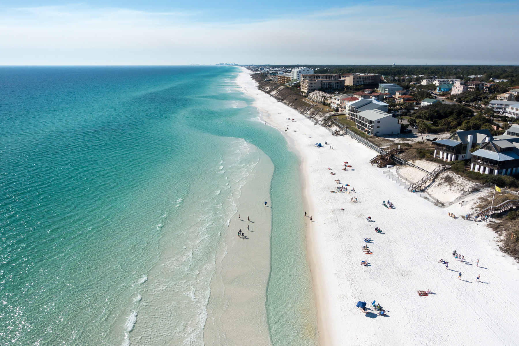 An aerial view of the shoreline and gulf front homes along 30A in Blue Mountain Beach
