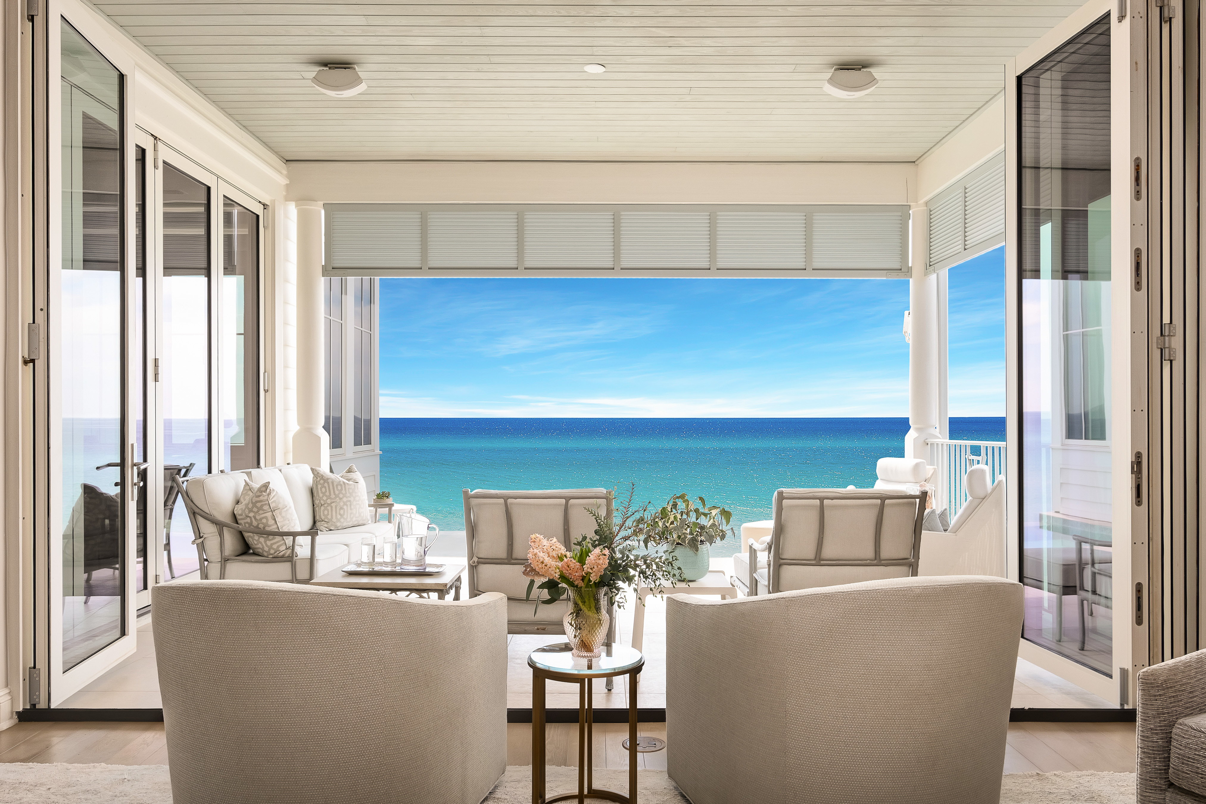 Picturesque view of the gulf waters from a gulf front luxury home's open balcony sitting area