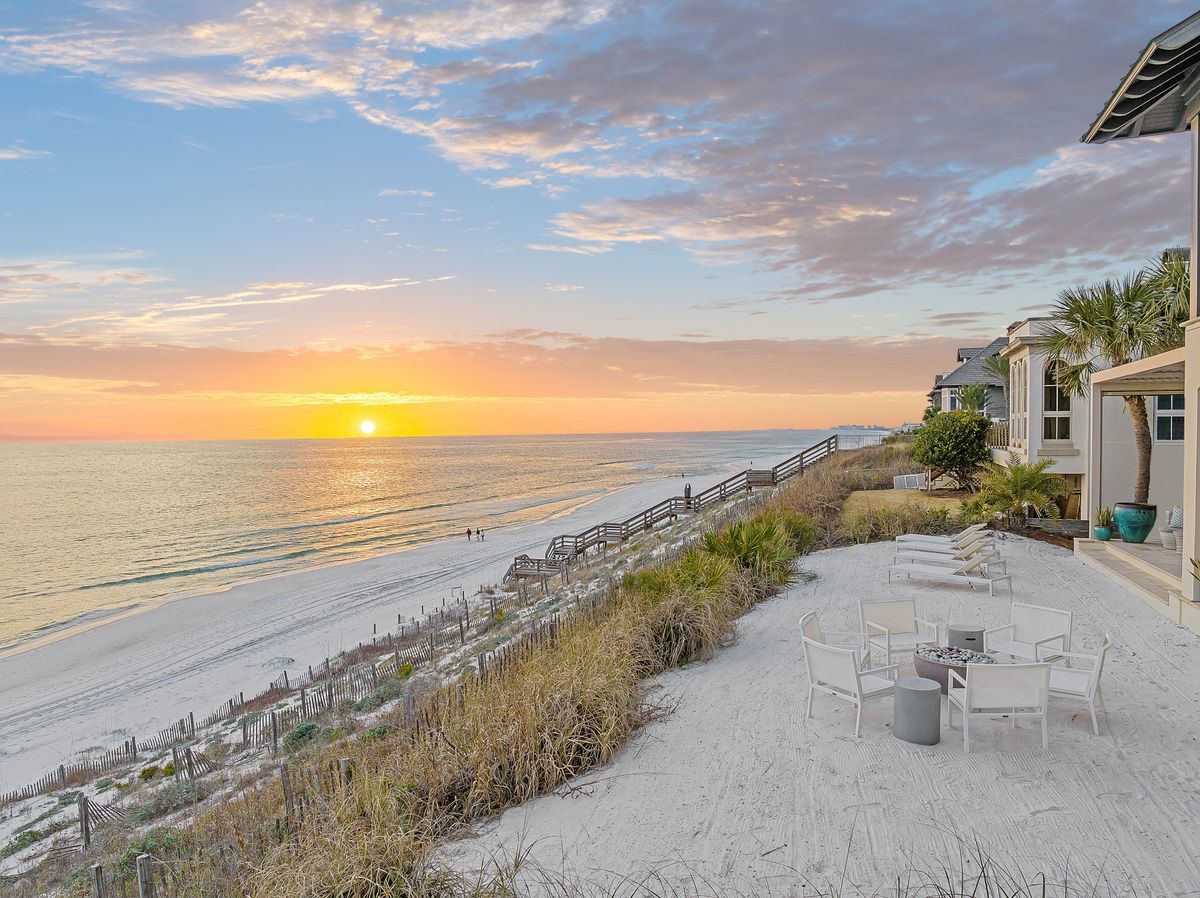 A view of the sunset along the beach from a Gulf front home