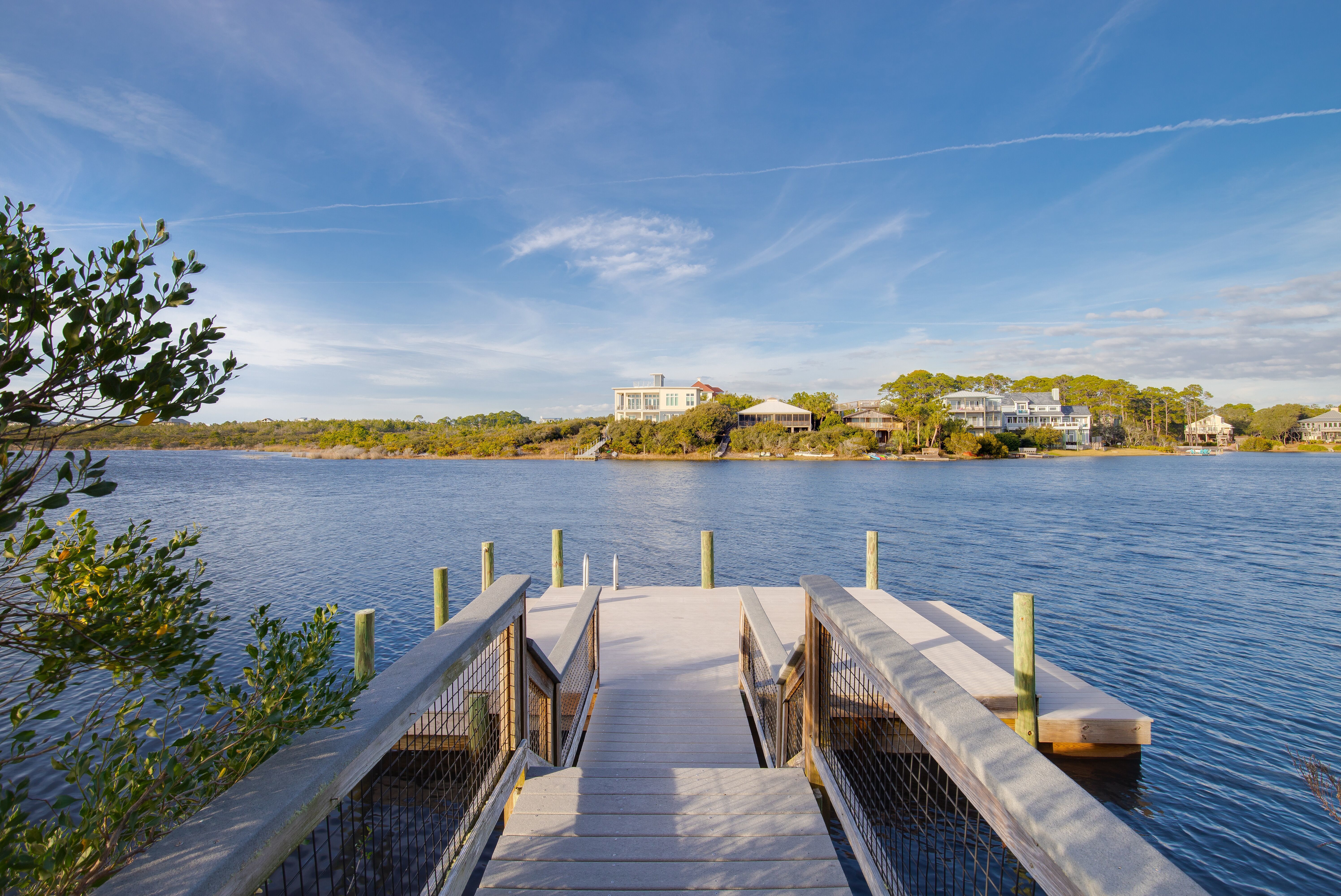 A private dock overlooking Stallworth Lake in the still of the day